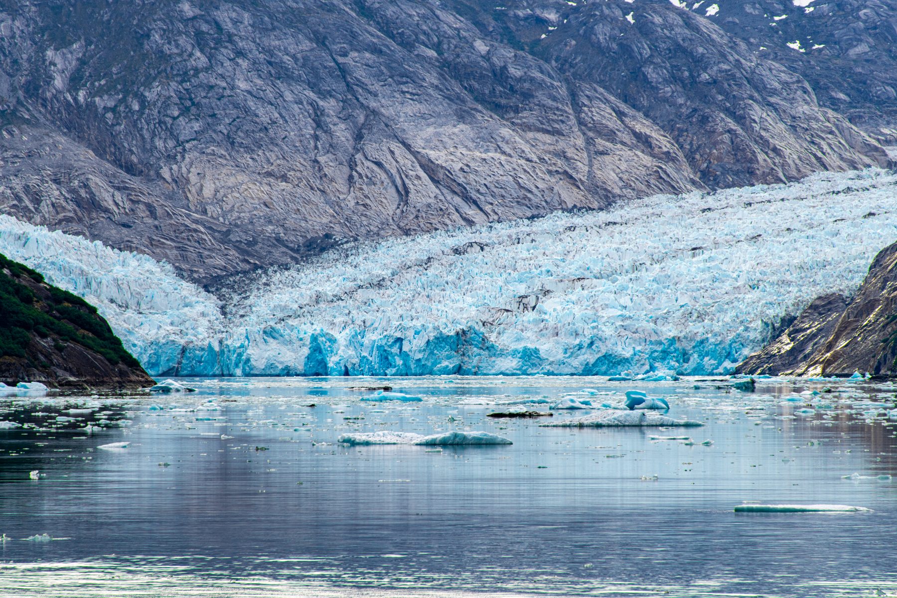 Tidewater glacier meeting the sea · Alaska